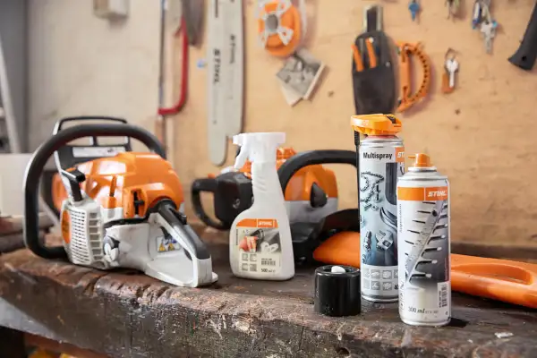 A STIHL technician checking outdoor power gear before summer use